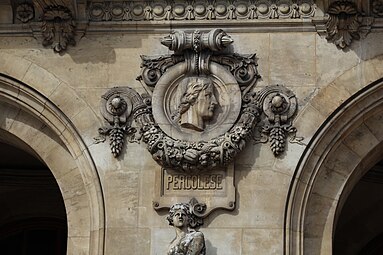 Neoclassical festoon on the facade of the Palais Garnier, Paris, designed by Charles Garnier, 1860–1875[12]