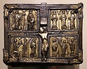 Panel from the Domnach Airgid, an 8th-century wooden reliquary reworked between the 13th and 15th centuries.[64]