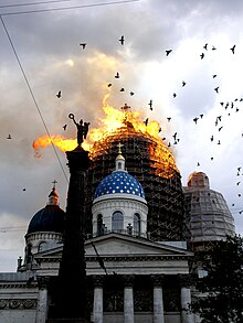 The cathedral with the main dome on fire
