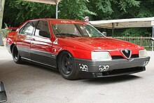 A four-door saloon car which has been modified for motor racing
