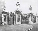 Forecourt gate piers, gates, railings and lamps
