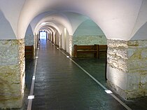 View of the crypt from west to east showing the low curved ceiling and the bays created by the junctions of the arches