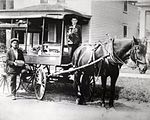 David and Harry Silverman in their fruit-peddling cart, Saint Paul, Minnesota, c. 1920