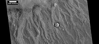 Channels made by the backwash from tsunamis, as seen by HiRISE. The tsunamis were probably caused by asteroids striking the ocean.