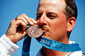 James Graves wearing a bronze medal at the 2000 Summer Olympics, the last version of the Trionfo design