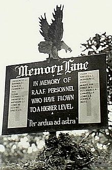 Sign with an eagle on top, reading "Memory Lane In memory of R.A.A.F personnel who have flown to a higher level 'Per ardua ad astra'", and a list of those killed