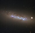 NGC 4248 is located about 24 million light-years away.[24]