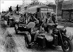 Soldiers on motorcycles and sidecars