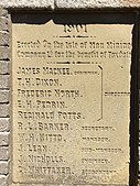This tablet, bearing the names of the directors of the Isle of Man Mining Company, was inserted into the lower part of the tower in 1939.