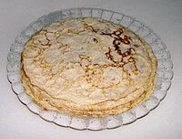 Frixuelos. This is a kind of crêpe made in Asturias, Spain.