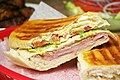 Image 6A Cuban sandwich is a variation of a ham and cheese sandwich that originated among the Cuban workers in the cigar factories in Key West, Florida[1][2]