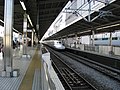 View of the Shinkansen platforms from the eastern end of platforms 3 and 4 in February 2011