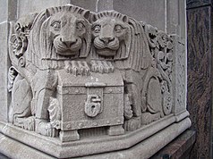 Stone carvings of lions that guard the door