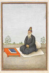 Painting of an older, bearded man holding beads, seated in front of a book
