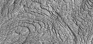 Close view of layers and rough terrain in northwestern Schiaparelli crater (HiRISE)