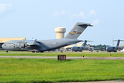 A C-17A Globemaster III of the 911th Airlift Wing about to exit the runway with its sister ships on the flight-line at Pittsburgh International Airport ARS