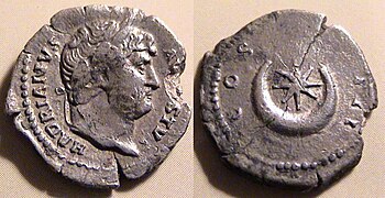 Coin of Roman Emperor Hadrian (r. 117–138). The reverse shows an eight-rayed star within a crescent.
