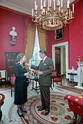 President Ronald Reagan and Prime Minister of the United Kingdom Margaret Thatcher in the Red Room, 1983.