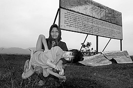 Kan Lay, 55 years old, and her son, Ke Van Bec, 14 years old, A Luoi Valley, Vietnam, December 2004.
