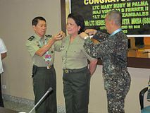 Dr Mary Ruby M Palma of the Quezon City, Gender and Development Resource and Coordinating Office is donned with rank of lieutenant colonel in the reserve force, Philippine Army.