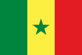 The flag of Senegal, a charged vertical triband.