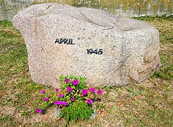Memorial stone for the refugees and civilians killed at the very first meeting spot in Lorenzkirch, Germany
