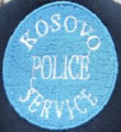 First cap badge of the Kosovo Police Service[21]