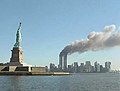 Image 14The World Trade Center on fire and the Statue of Liberty. (from Contemporary history)