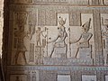 Ptolemy XII before Isis and Osiris, at the Hathor Temple, Dendera.[13][20]