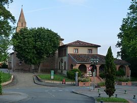 The town hall and church in Auzielle