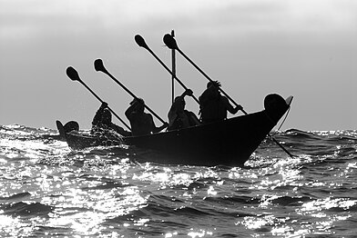 Paddlers making the crossing to Santa Cruz Island aboard the reconstructed tomol ‘Elye’wun, in 2006.