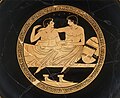 This image has been given the description of a "...courting couple at the symposium."[76] and a "Symposium scene with youths.".[76] Interior of an Attic cup. Artist; Painter from Colmar. Around 500 - 450 BCE. Louvre