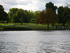 View south across the Serpentine to the Diana Memorial Fountain on the south bank.