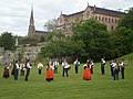 Band of pipers playing in front of the palace of Sobrellano
