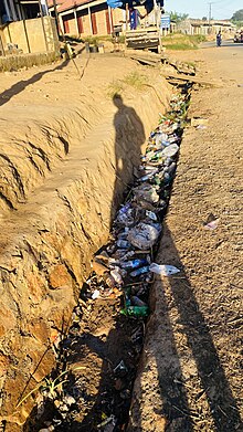 Garbage and plastic waste in drainage channel in Butare town in Bushenyi District in Western Uganda
