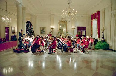 The Marine Band performing in the Entrance Hall at the White House in conjunction with an official dinner held for British Prime Minister Margaret Thatcher, 1988