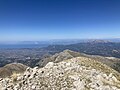The bridge is visible from incredible distances. It is just observable from the top of Mount Erymanthos, Olenos Peak. Distance is about 21 miles.