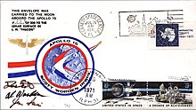 A rectangle with the headline "An Apollo 15 Flown Lunar Postal Cover" with a logo in the middle. Below it are two smaller frames. One has some text certifying that what was below was flown to the Moon and back, signed by flight commander David Scott. Below it is an envelope with stamps, logos and, postmarks.