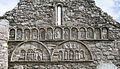 Blind arcade on Ardmore Cathedral, Ireland, with sculpted Biblical scenes (12th century)