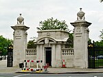 Buckingham Gate lodge, gate piers, gates and railings