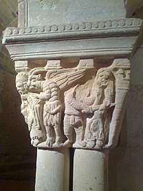 Capital of amorphous form surmounting a cluster of shafts. The figurative carving shows a winged devil directing Herod to slaughter the Innocents. Monastery of San Juan de Duero, Soria, Spain
