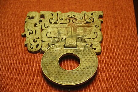 Mascaron on an ornamental handle of a bi disc, c.100 BC, jade, Museum of the Mausoleum of the Nanyue King, Guangzhou, Guangdong, China