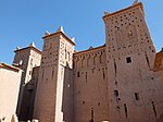 View of the main house inside the kasbah: a typical square-based structure with four corner towers, though a fifth tower (the middle tower seen here) was added after the original construction