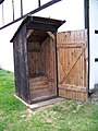 Interior of an outhouse, the type of structure usually built over the pit to provide privacy