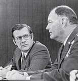 Chairman of the Joint Chiefs of Staff General George S. Brown with Secretary of Defense Donald Rumsfeld during a press conference in The Pentagon on January 15, 1976.