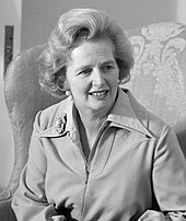 Thatcher sitting in a black-and-white photograph