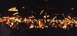 6 – Setting Fire to the Galley. After the singing of the Up Helly Aa song, the guizers throw their torches into the longship.