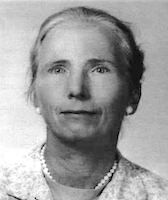 black and white headshot of Stein an older white woman who has long hair put up and is wearing pearls