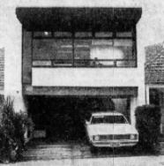 Black and white photo of a two-storey building