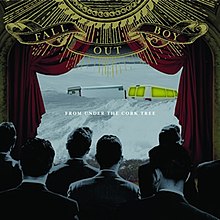 A monochromatic audience of men dressed in black suits sits watching a stage. Red curtains open up to reveal a band van with its lights on stuck in a snowstorm. Above the scene sits the bands name, "FALL OUT BOY" in ornate gold text. tinier white text reads "from under the cork tree" in the snow